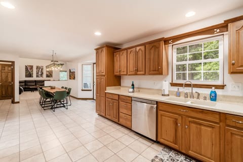 Fully equipped kitchen with modern appliances for home-cooked meals.