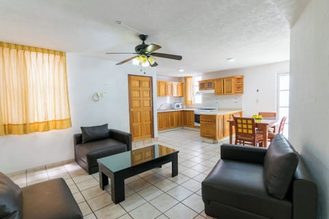 Deluxe Studio | Living area | TV