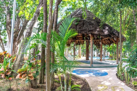 Outdoor pool, open 7:00 AM to 10:00 PM, pool umbrellas, sun loungers