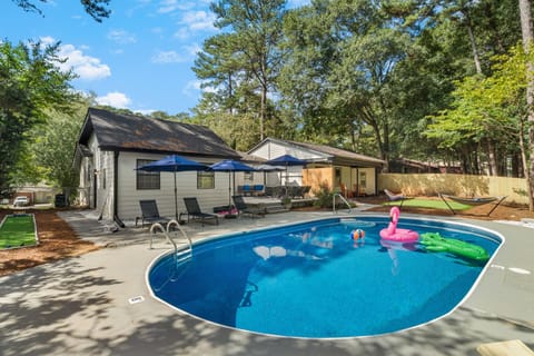Back Yard with Pool, putt putt, outdoor bowling + more!