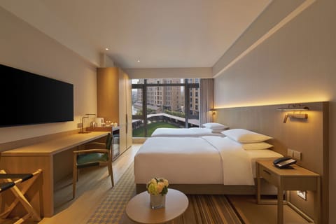 2 Twin Beds | Down comforters, in-room safe, desk, laptop workspace