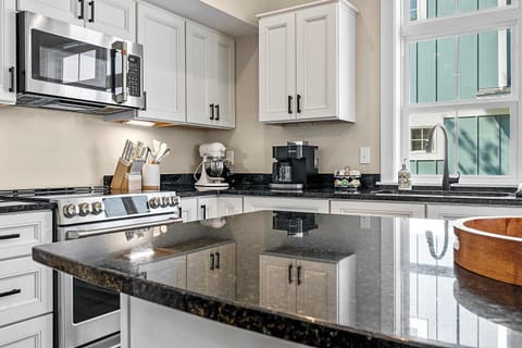 Black Granite counters throughout.
