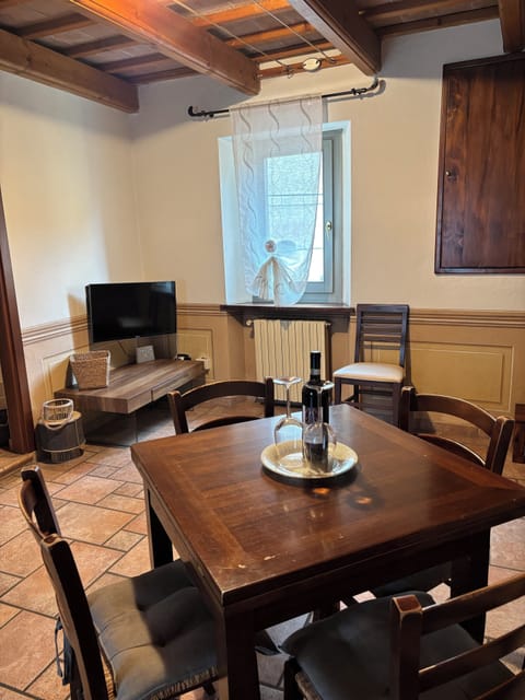 Basic Apartment, City View | Living area | Flat-screen TV