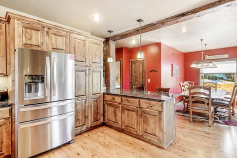 The inviting kitchen offers ample space & every home comfort