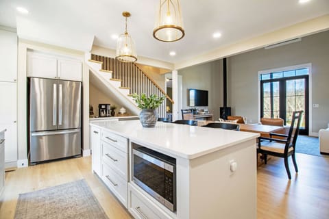 Full kitchen includes stove top, oven, microwave, dishwasher, refrigerator, and more!