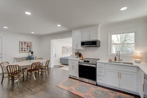 The dining room and kitchen.