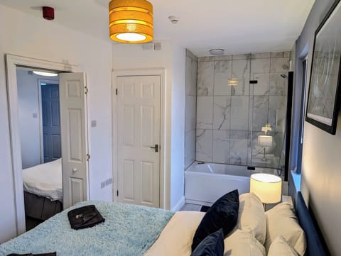 Family Quadruple Room, City View | Individually decorated, free WiFi, bed sheets