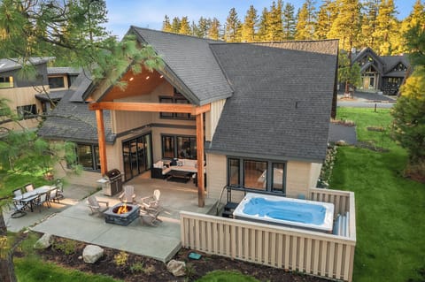 Wine Down: - Fantastic outdoor living space with a hot tub (not pictured) and larger tub for children swimming.