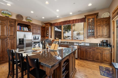Kitchen Shot With Appliances & Bar