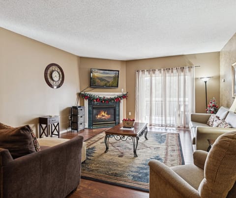 Two Bedroom Whispering Pines Vacation Rental Condo Sleeps 6 Indo - Spacious Living Room with Gas Fireplace, Sleeper Sofa and SMART TV with Cable & WIFI throughout vacation rental