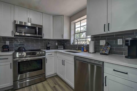 Fully equipped kitchen with free coffee to start your day right! #CoffeeLovers #KitchenPerks #TampaStay