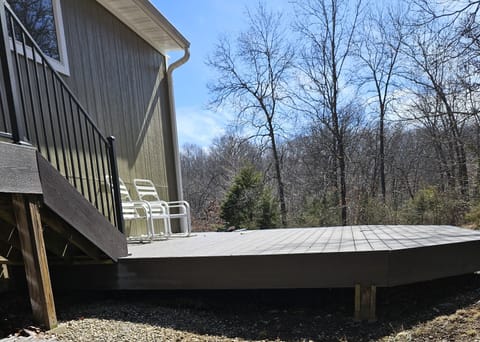 Take in the surrounding nature on the back deck.