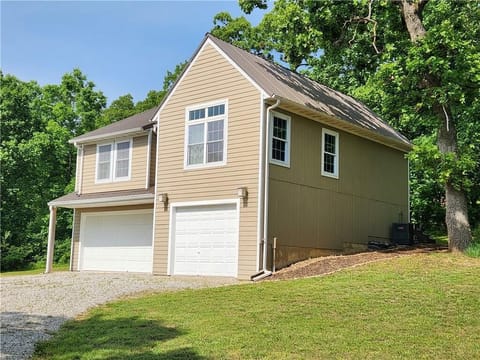 Welcome to Peaceful Pointe! Private drive take you to 9 acre get-a-way.