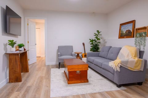 Relax in the bright, welcoming living space, complete with a 50` Samsung smart TV.