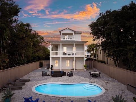 This house boasts balconies on every floor, offering stunning views of 30A and the surrounding coastal beauty.