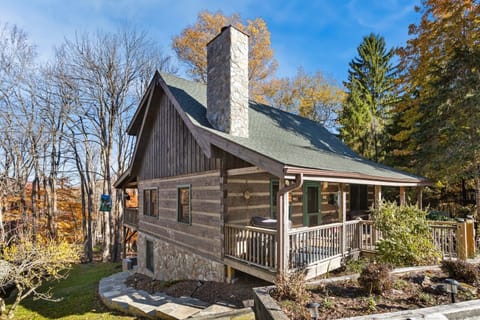 Front of Silver Rock Lodge with Covered Front Porch and Stone Steps to the Lower Patio