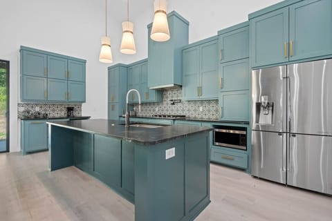 Upgraded kitchen, fully stocked with cooking essentials to prepare meals just like home.