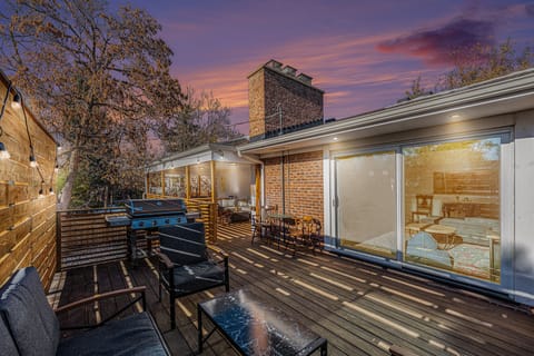 Additional cozy seating at the other end of the deck, providing plenty of space to relax and take in the surrounding views.