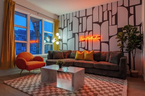 Unwind in our stylish, cozy living room after a busy day and enjoy the perfect getaway in Calgary!!