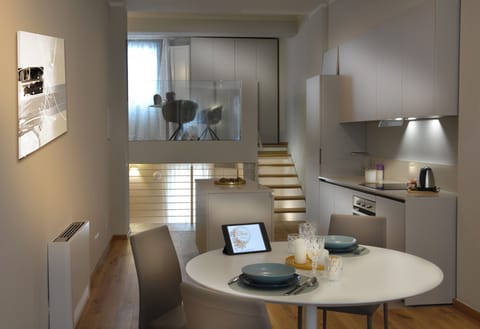 Executive Apartment | Living area | 35-inch Smart TV with digital channels