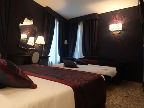Standard Triple Room, Private Bathroom | In-room safe, desk, blackout drapes, cribs/infant beds