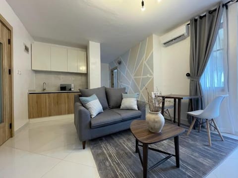 Family Apartment, Balcony, City View | Living area