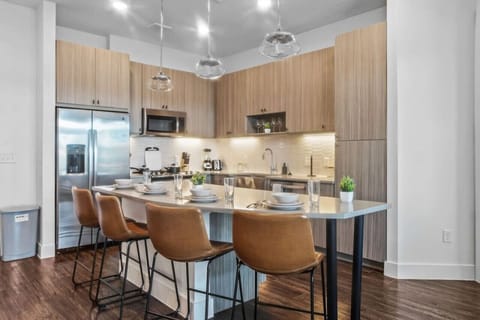 As you take your seat, the dining room's sophisticated design sets the stage for memorable meals and conversations.