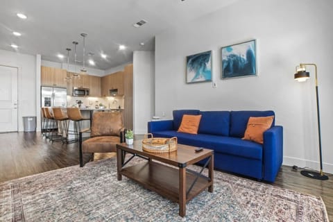 As you take a seat in the living room, the comfortable furniture and tasteful design make it easy to unwind.