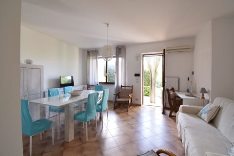 Apartment, Patio, Garden View | Living area | 32-inch flat-screen TV with cable channels