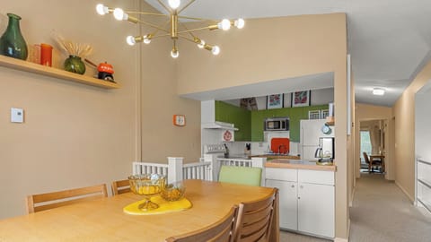 Enjoy family dinners in this beautifully lit and welcoming dining room