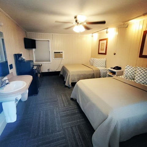 Standard Room, 2 Double Beds | Individually decorated, iron/ironing board, free cribs/infant beds