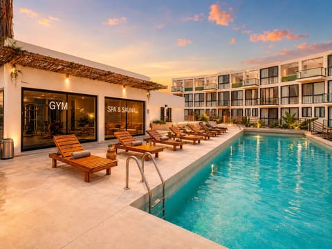 Resort-style pool just steps from the gym and wellness area.