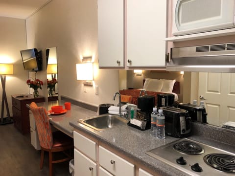 Studio Suite, 1 Queen Bed, Kitchenette | Private kitchenette | Full-size fridge, microwave, stovetop, toaster
