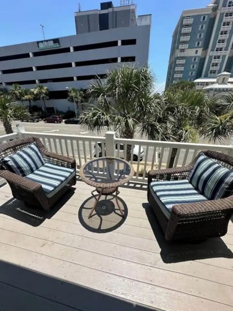 Relax in the sunny courtyard with plush outdoor seating