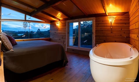 Honeymoon Cabin, Hot Tub, Lagoon View | Deep soaking bathtub
