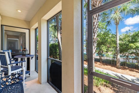 Step onto your private covered patio where tropical palm views and outdoor dining await your morning coffee moments.