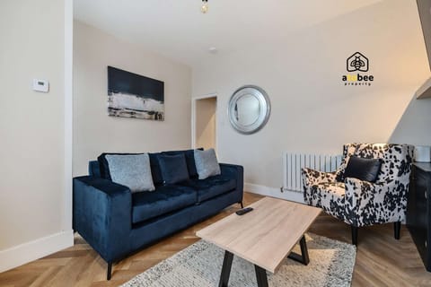 With plush seating and a warm ambiance, this living area is designed for moments of comfort and connection.