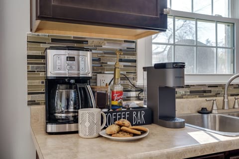 Start your mornings right with a fully equipped coffee station, perfect for brewing your favorite cup.