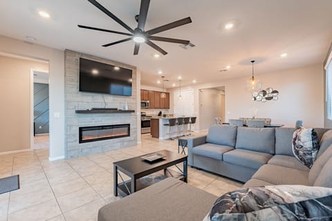 65-inch tv with a sound bar an electric fireplace for your enjoyment. 