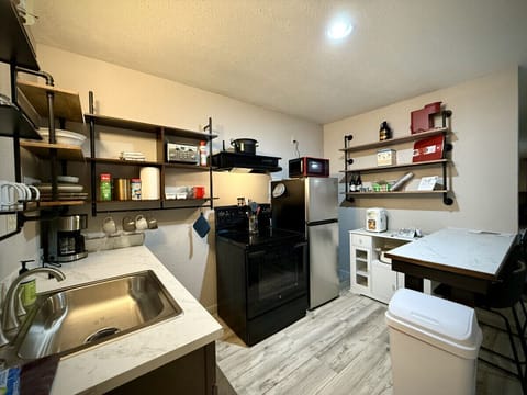 Kitchen stocked with many amenities including locally roasted Sorbenots coffee