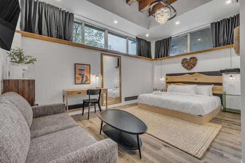 Signature Quadruple Room | Premium bedding, soundproofing, iron/ironing board, free WiFi