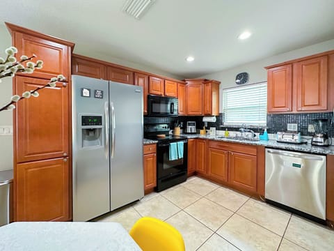 Full kitchen, stocked with basic essentials.  Includes air fryer too