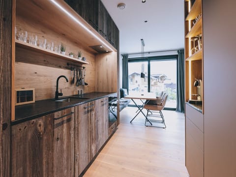 Kitcen in Apartment Alpinero 405 by we rent apartments Zell am See mountain view, garden, dog friendly.