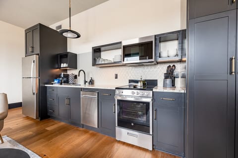 Fully equipped kitchen with modern appliances, offering everything you need for preparing meals or enjoying a morning coffee.