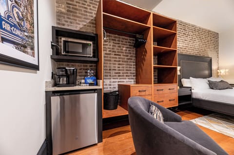 Conveniently equipped with a coffee station, mini-fridge, and microwave.