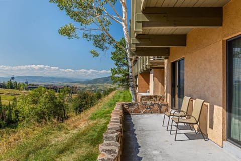 Take in the lush scenery for your morning coffee or evening drinks