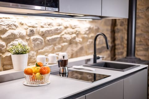 Kitchen, Countertop, Kitchen Appliance, Home Appliance, Plumbing Fixture, Sink, Kitchen Sink, Interior Design, Cabinetry, Tap