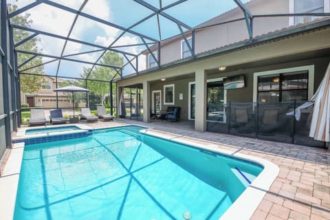 Dive into relaxation with your own private screened pool and spa, perfect for sunny afternoons.