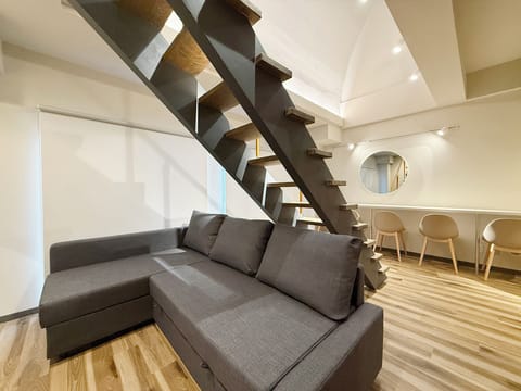Deluxe Apartment, Balcony | Living area | 43-inch Smart TV with digital channels
