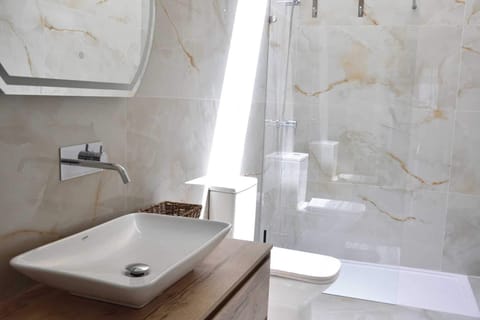 Superior Double Room, Sea View | Bathroom | Shower, hair dryer, towels, soap